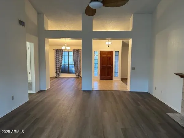 a view of a house with a yard and garage