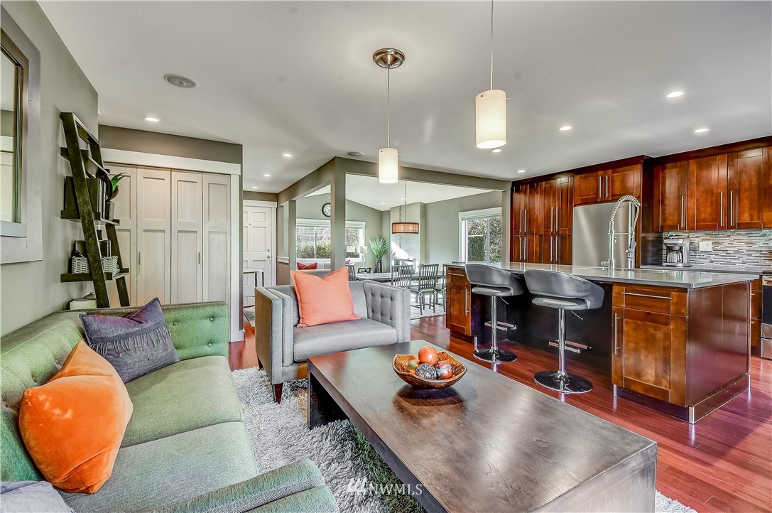1307 221st Place Southwest Bothell, WA 98021 - Photo 11 of 20 a living room with furniture and kitchen view