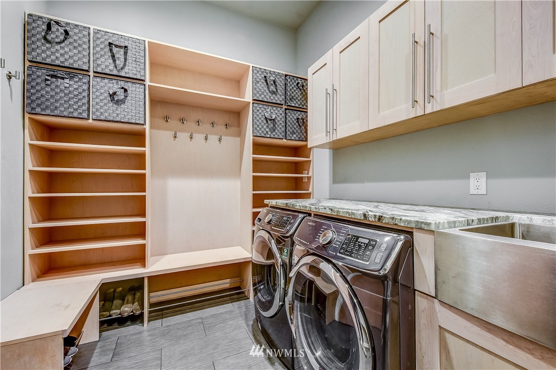 1307 221st Place Southwest Bothell, WA 98021 - Photo 18 of 20 a view of walk in closet with clothes and shoes