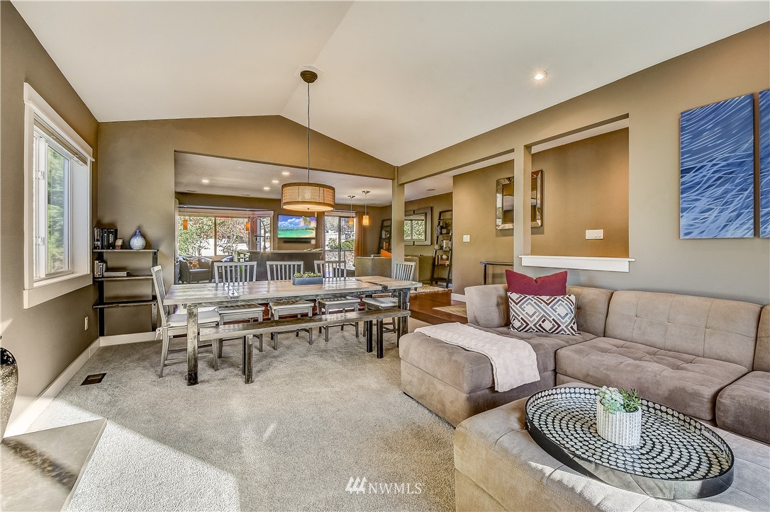 1307 221st Place Southwest Bothell, WA 98021 - Photo 4 of 20 a living room with furniture and a large window
