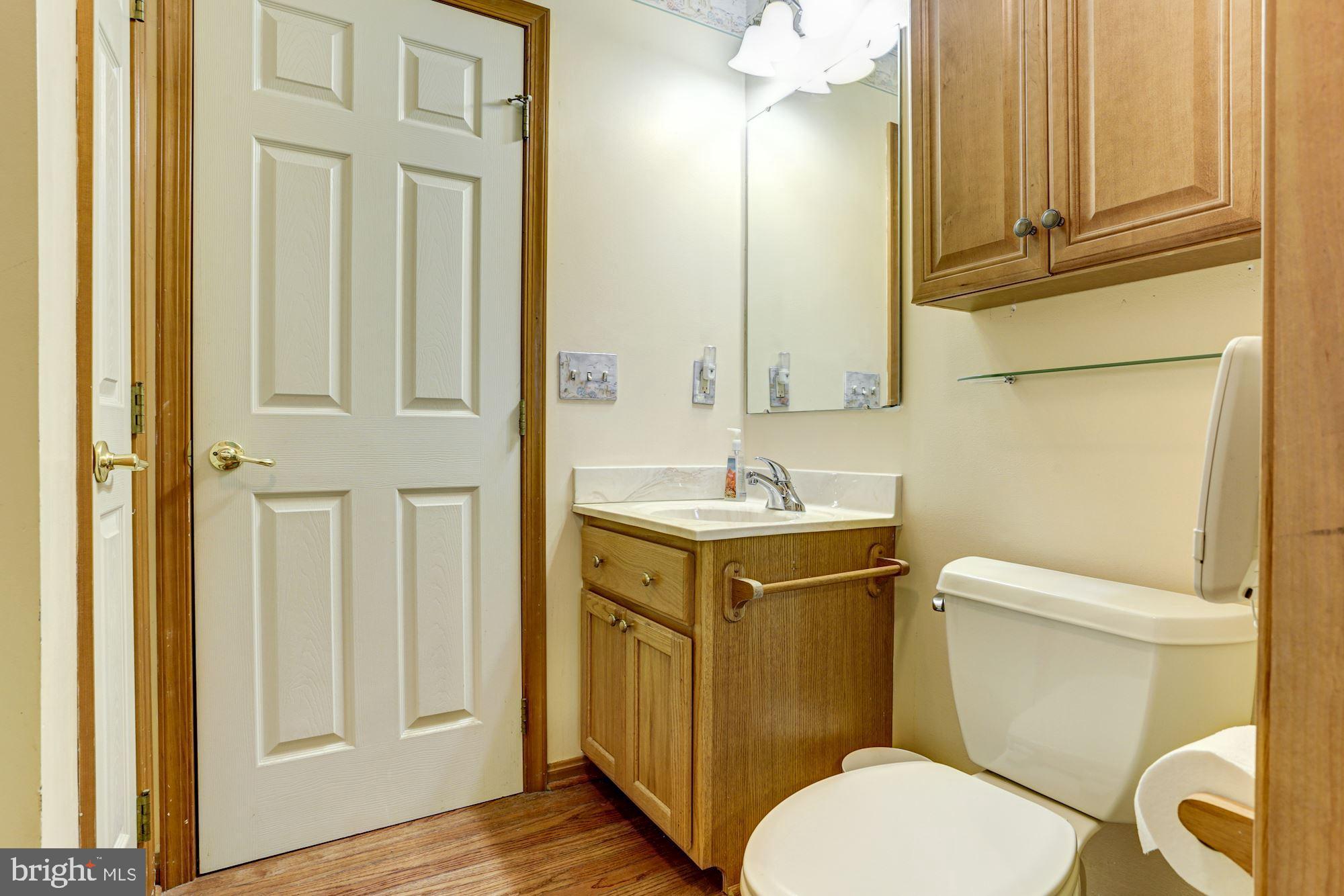 117 Norman Road Pasadena, MD 21122 - Photo 22 of 44 Main level primary has full bath