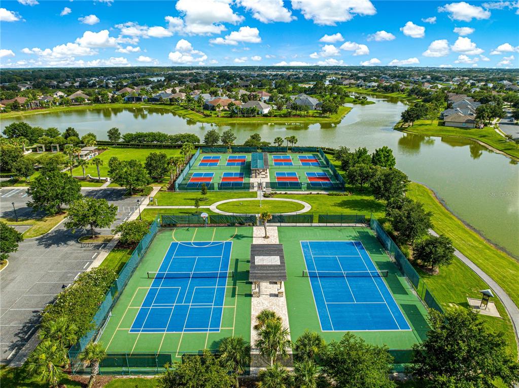8045 Waterbury Way Mount Dora, FL 32757 - Photo 48 of 56 a view of a swimming pool with an outdoor space and seating area