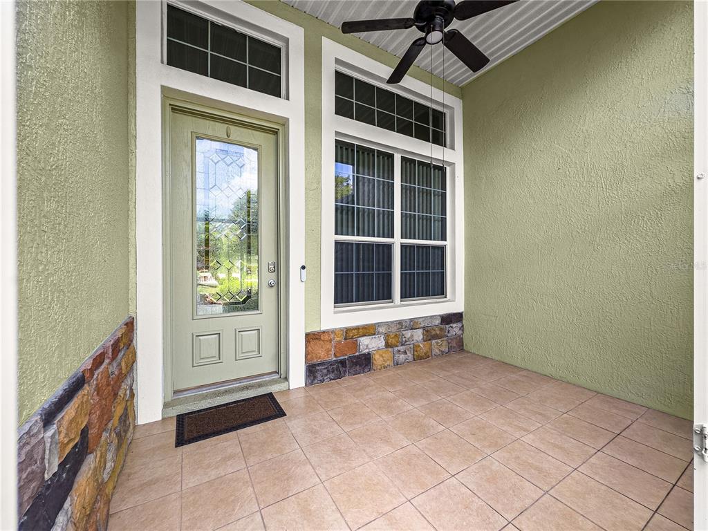 8045 Waterbury Way Mount Dora, FL 32757 - Photo 6 of 56 a view of front door