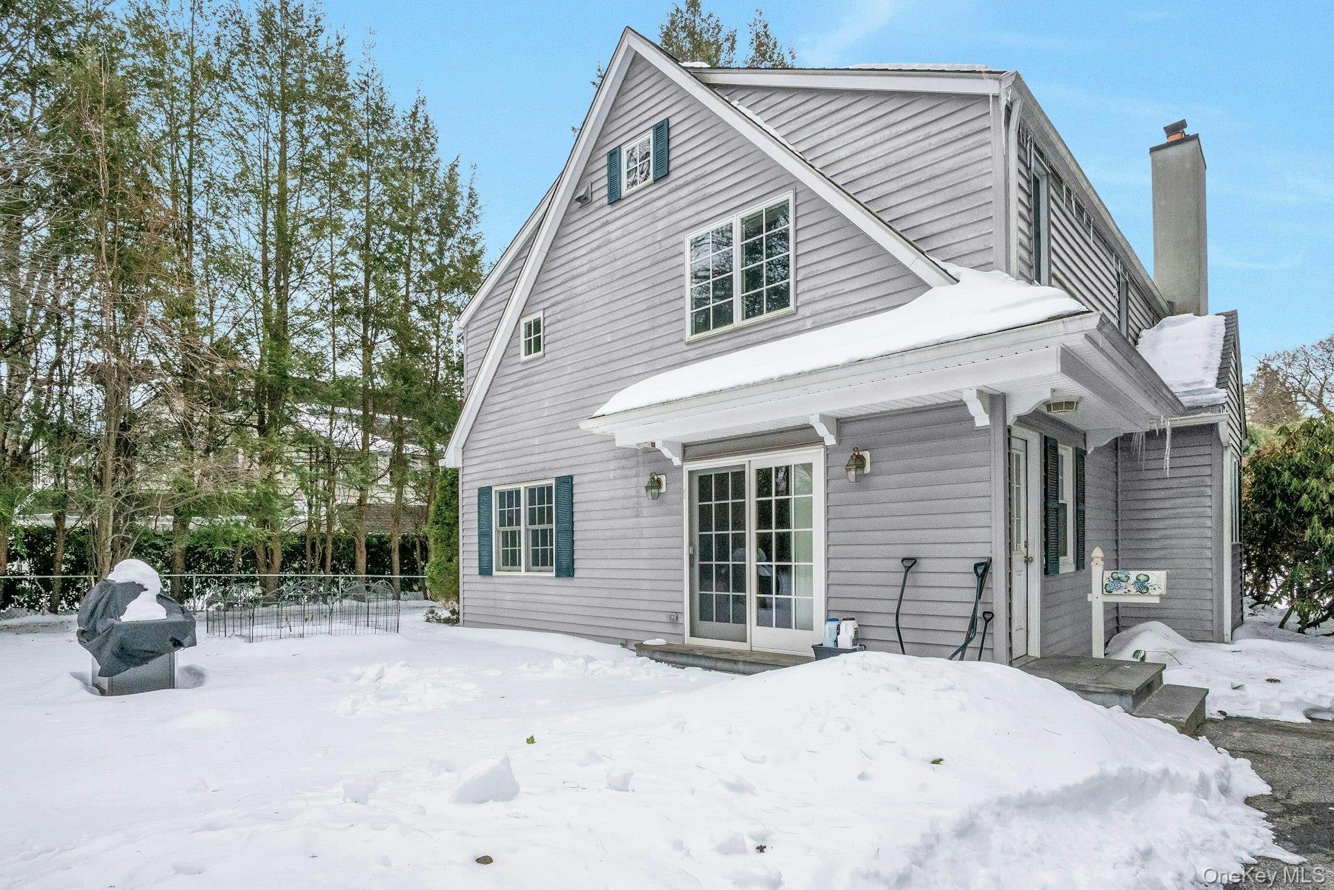 25 Maple Road Briarcliff Manor, NY 10510 - Photo 13 of 48 View from the backyard towards the SGD to the Kitchen.