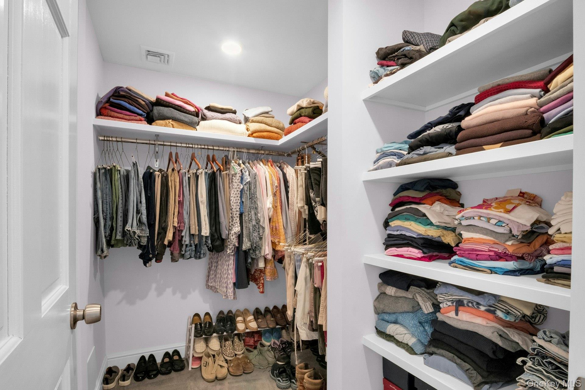 25 Maple Road Briarcliff Manor, NY 10510 - Photo 25 of 48 Just had to show you the size of the walk-in closet in the Primary BR. And how neat! Additional closets across the way.