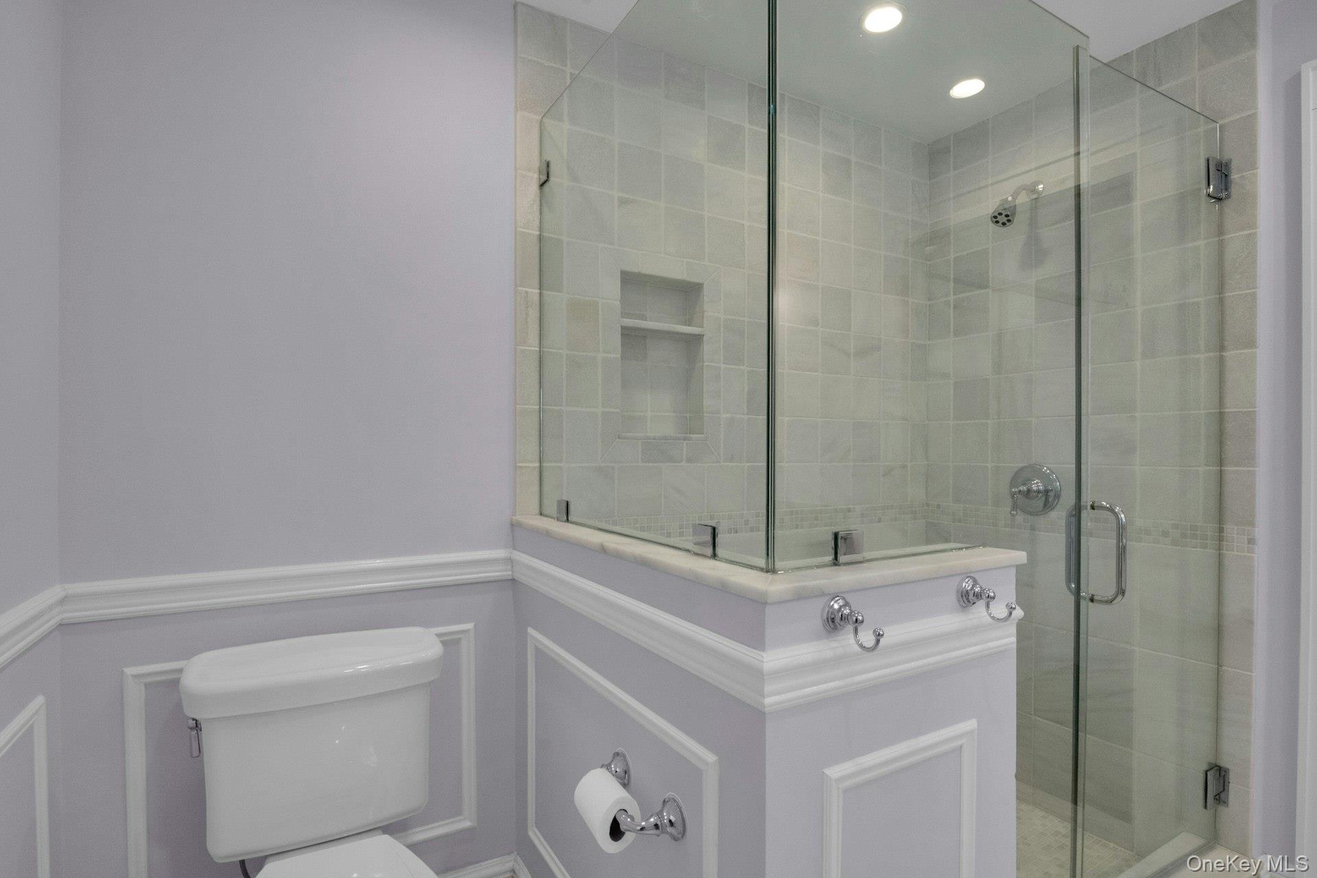 25 Maple Road Briarcliff Manor, NY 10510 - Photo 28 of 48 The Primary Bath glass door, tiled Shower & toilet area.