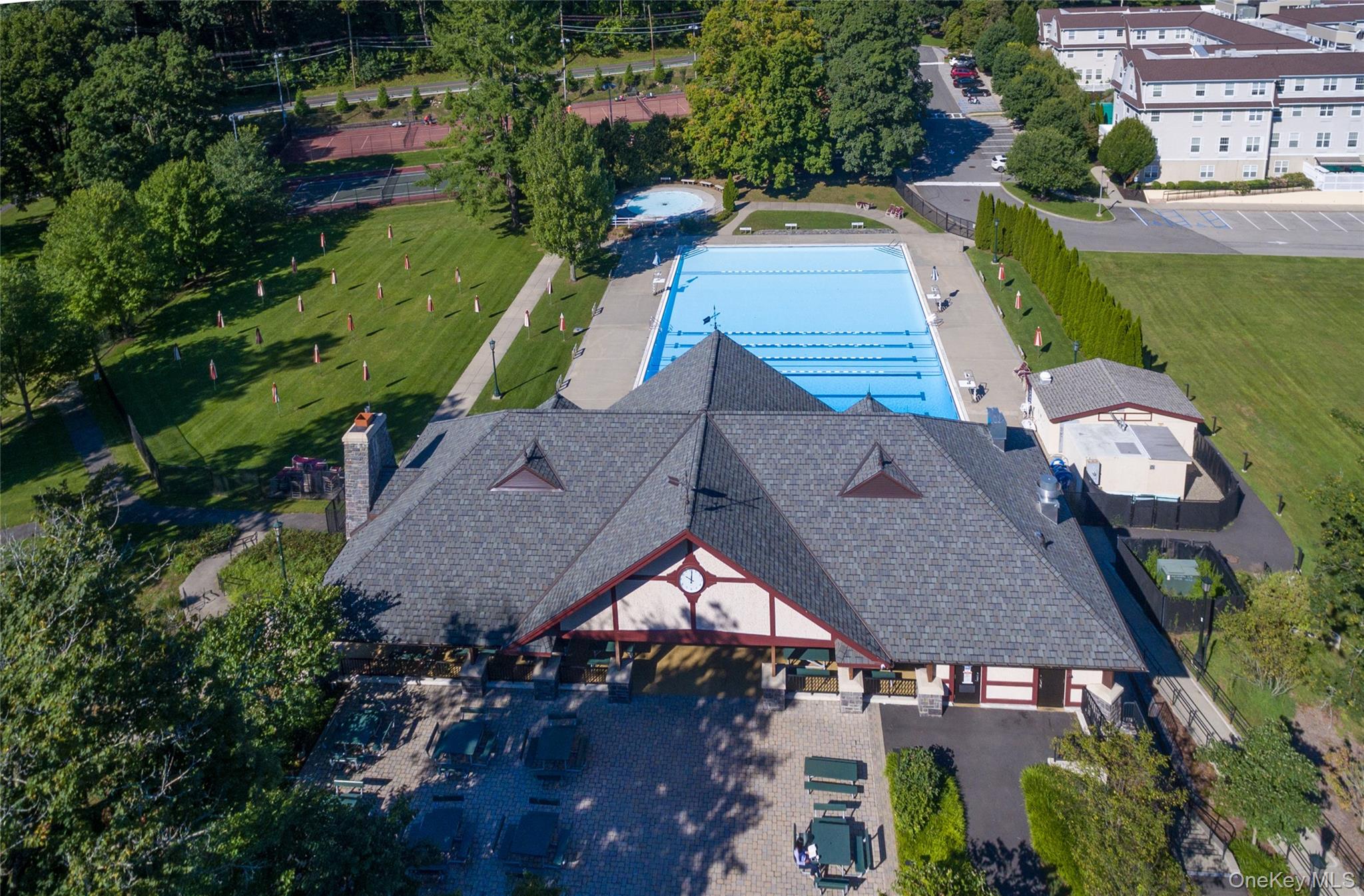 25 Maple Road Briarcliff Manor, NY 10510 - Photo 44 of 49 an aerial view of house with swimming pool outdoor seating and yard