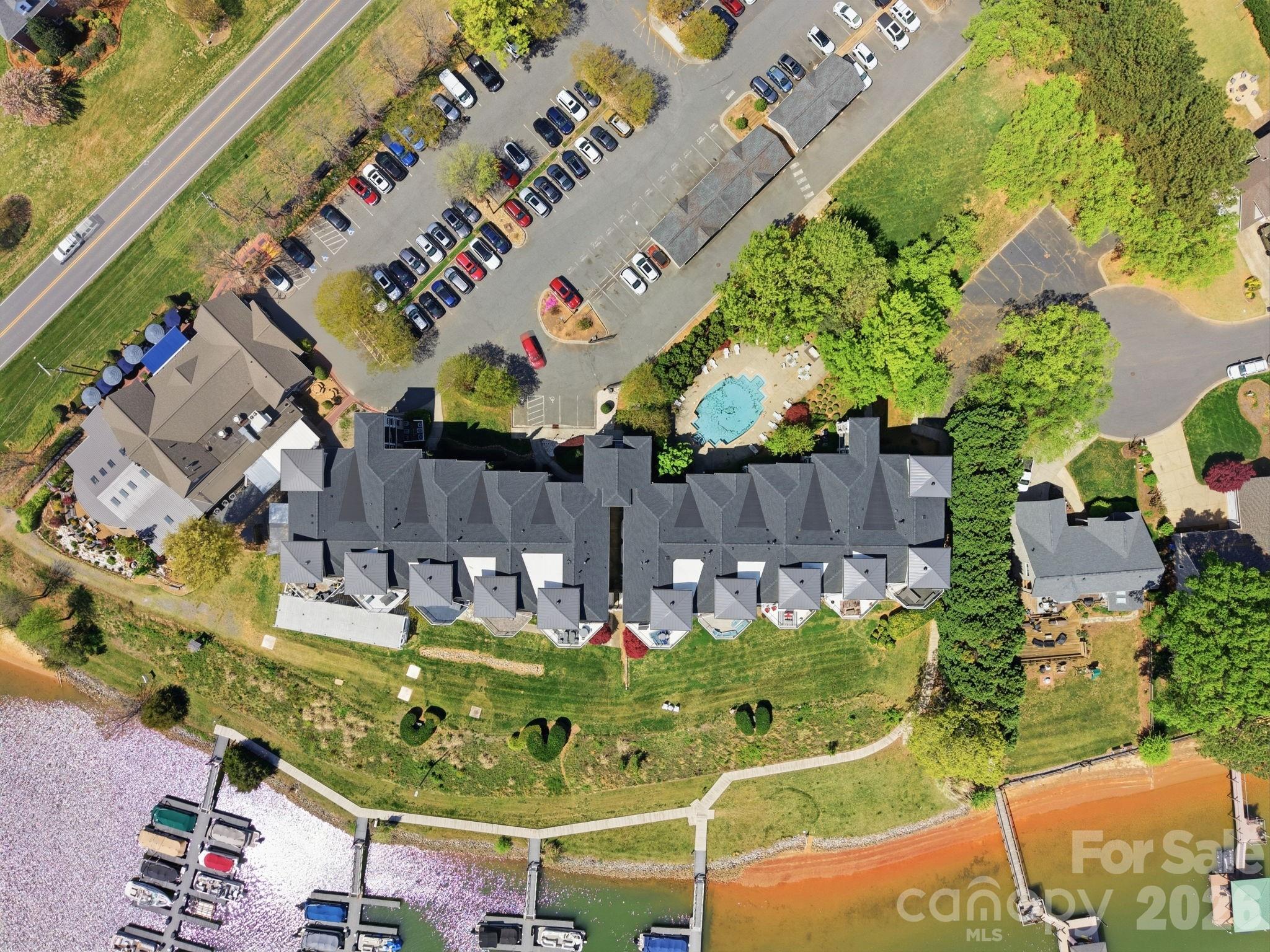 637 Williamson Road, Unit 307 Mooresville, NC 28117 - Photo 38 of 44 an aerial view of a chairs and table on the patio