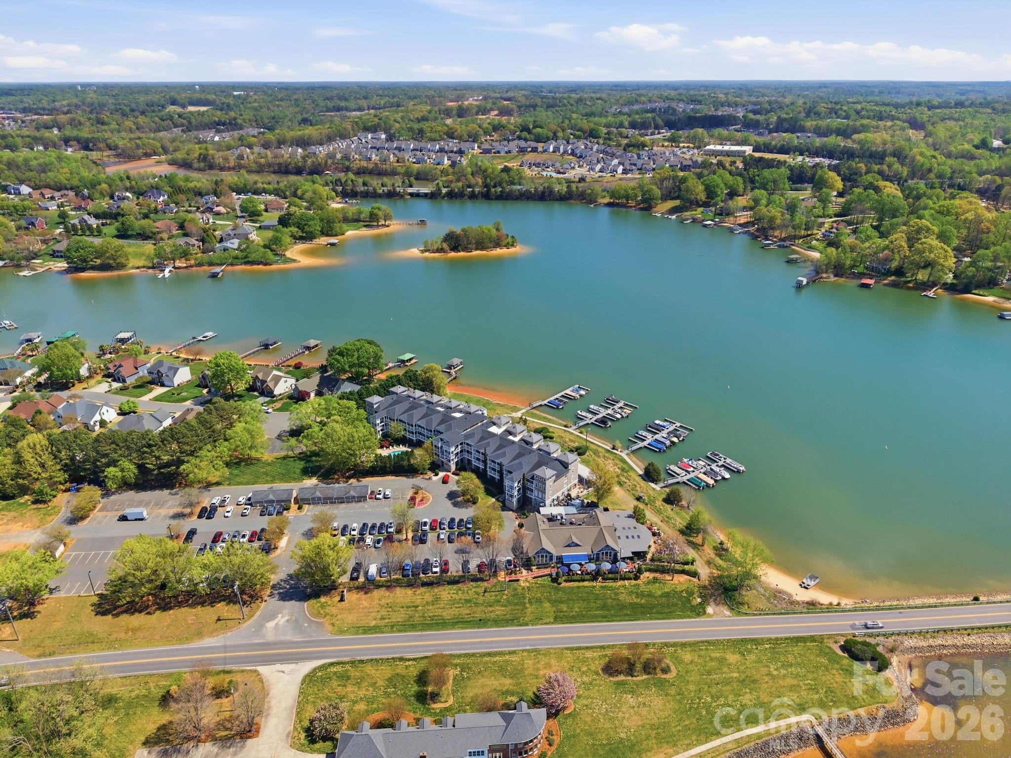 637 Williamson Road, Unit 307 Mooresville, NC 28117 - Photo 40 of 44 an aerial view of a city with lots of residential buildings lake and ocean view