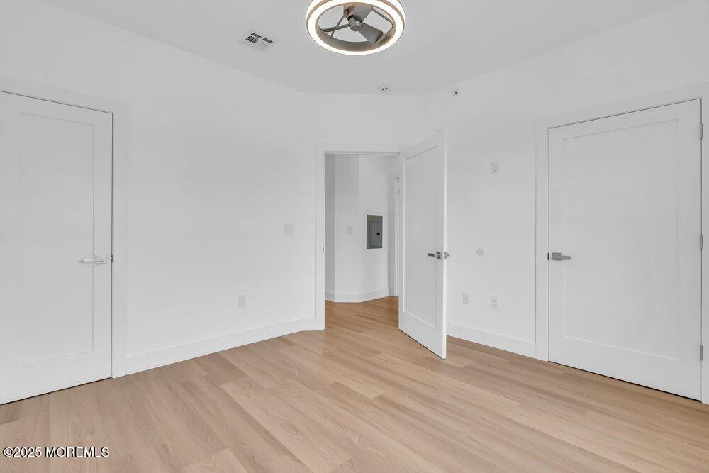 629-631 Highway 88, Unit 13 Point Pleasant, NJ 08742 - Photo 18 of 28 a view of livingroom with wooden floor