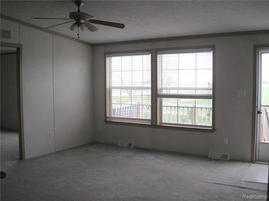 5938 North Hurds Corner Road Gagetown, MI 48735 - Photo 4 of 9 View of the living room.