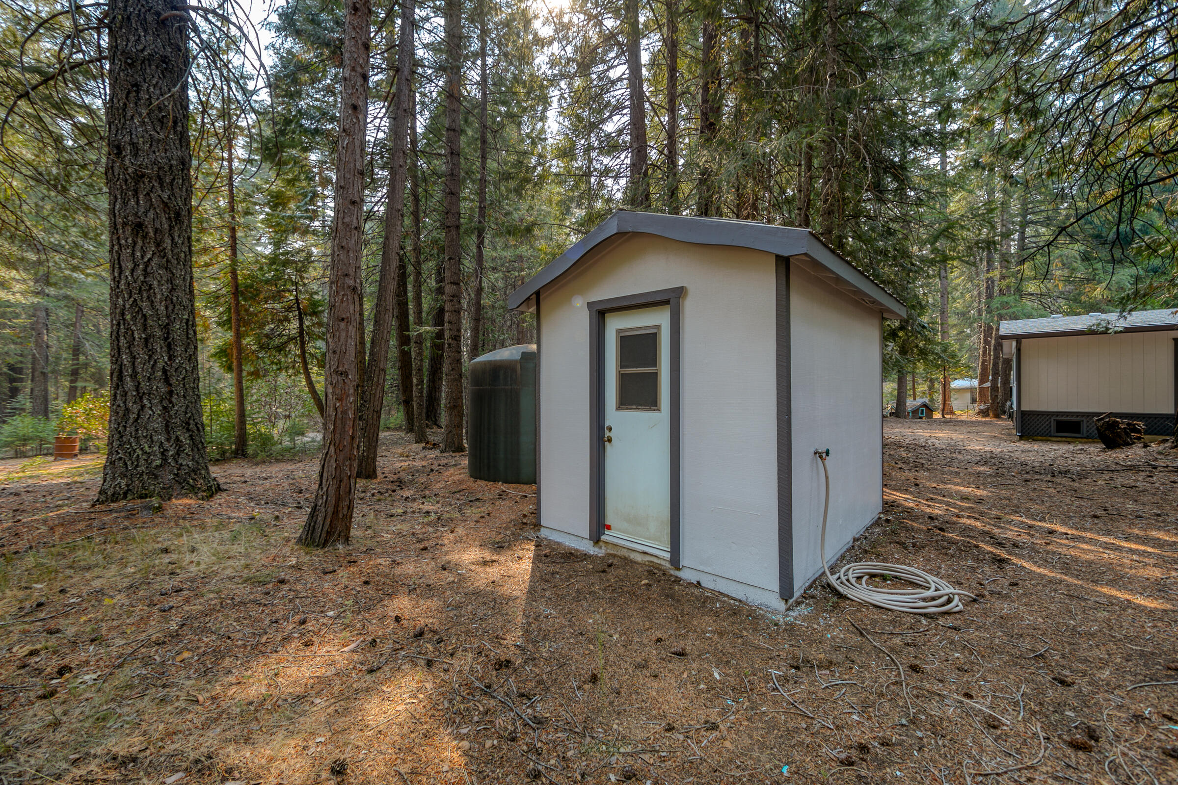 8133 Lake McCumber Road Shingletown, CA 96088 - Photo 46 of 56 Pump House & Water Tank