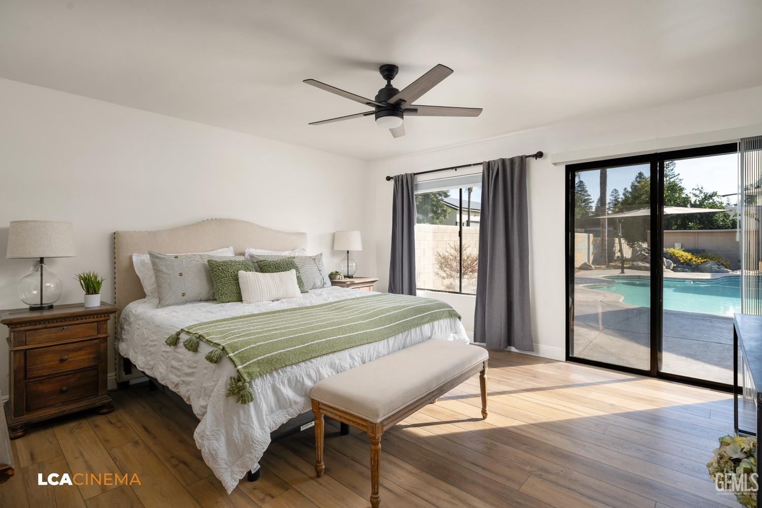 Undisclosed Address Bakersfield, CA 93312 - Photo 13 of 28 a bedroom with a bed and a view of balcony