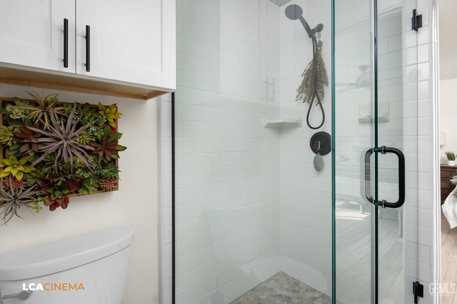 Undisclosed Address Bakersfield, CA 93312 - Photo 16 of 28 a bathroom with a shower