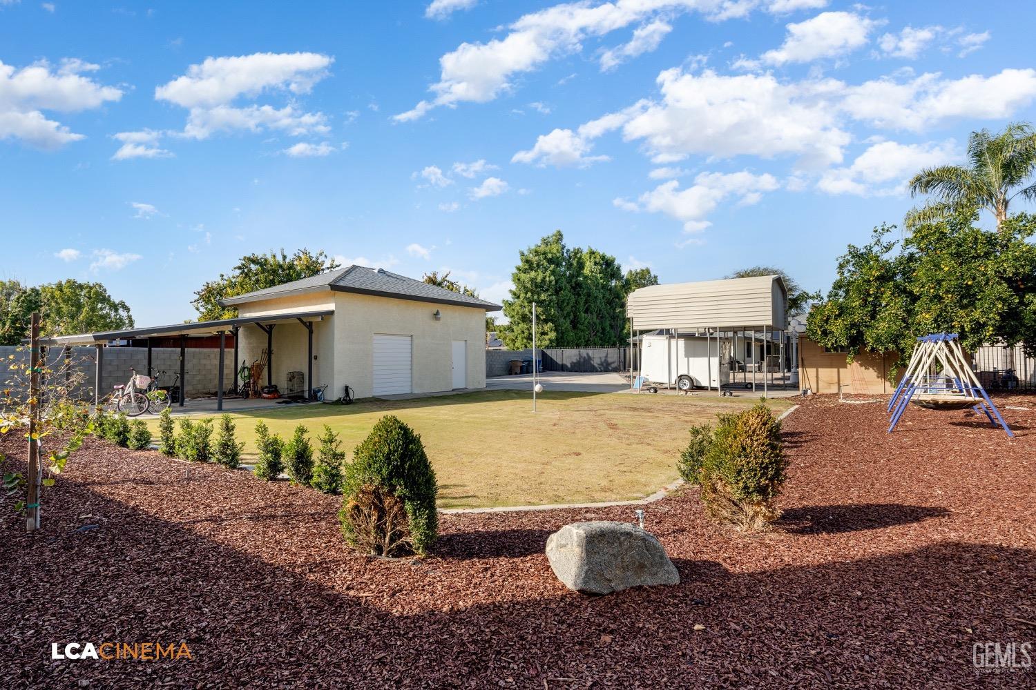 Undisclosed Address Bakersfield, CA 93312 - Photo 24 of 28 a view of a house with backyard and sitting area