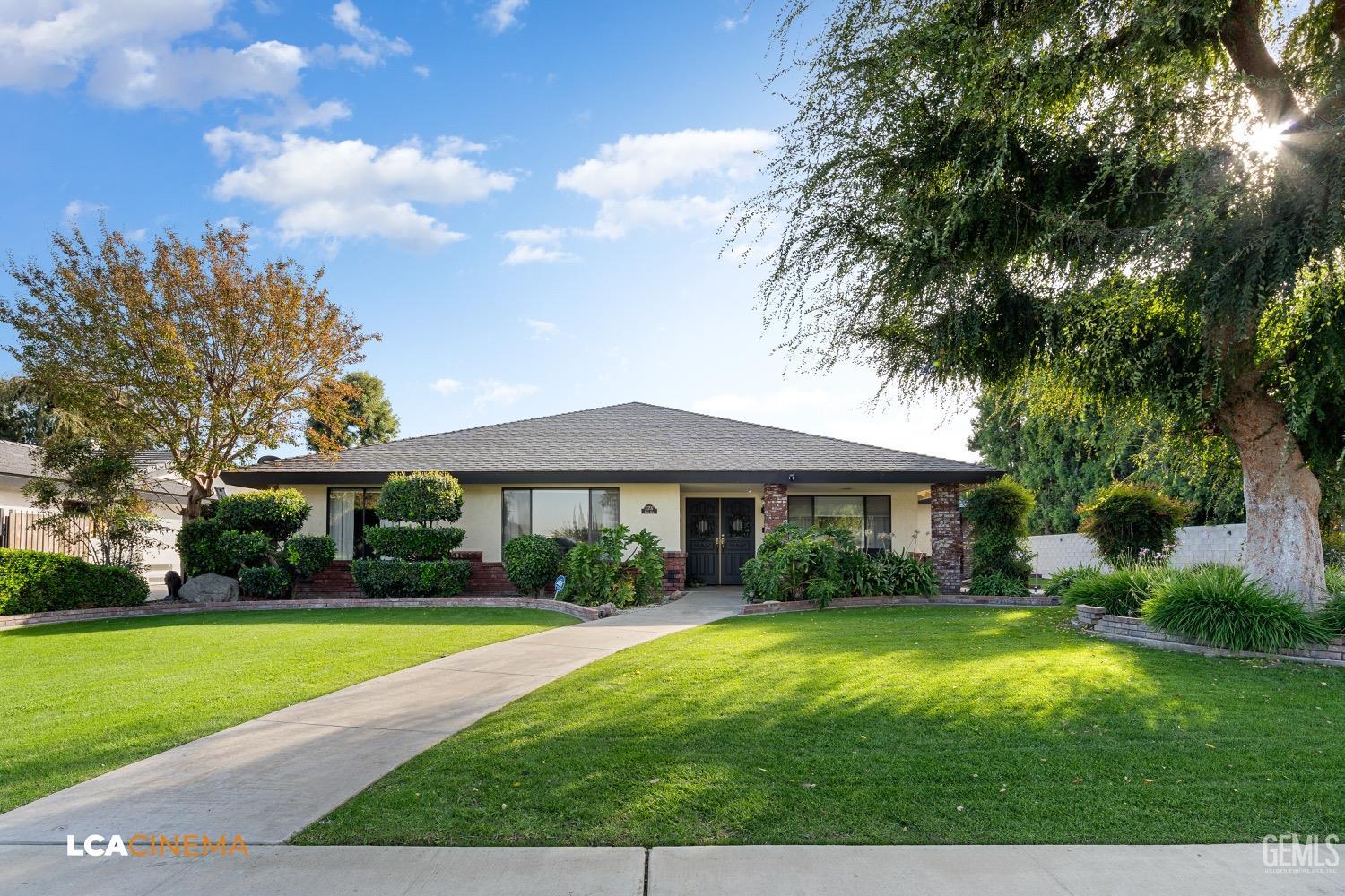 Undisclosed Address Bakersfield, CA 93312 - Photo 27 of 28 a front view of house with yard and green space