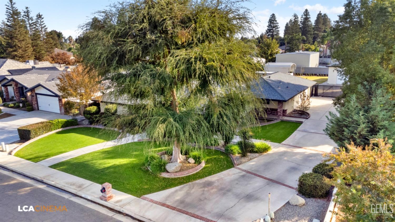 Undisclosed Address Bakersfield, CA 93312 - Photo 5 of 28 a view of a swimming pool with some potted plants
