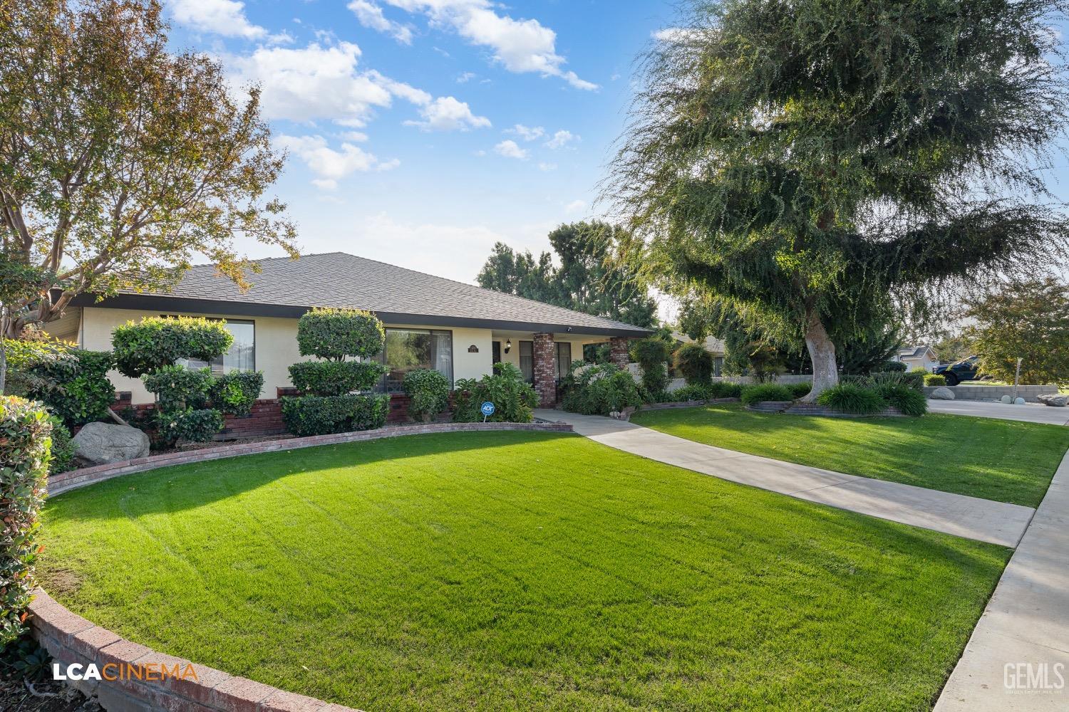 Undisclosed Address Bakersfield, CA 93312 - Photo 7 of 28 a view of pool with garden and trees