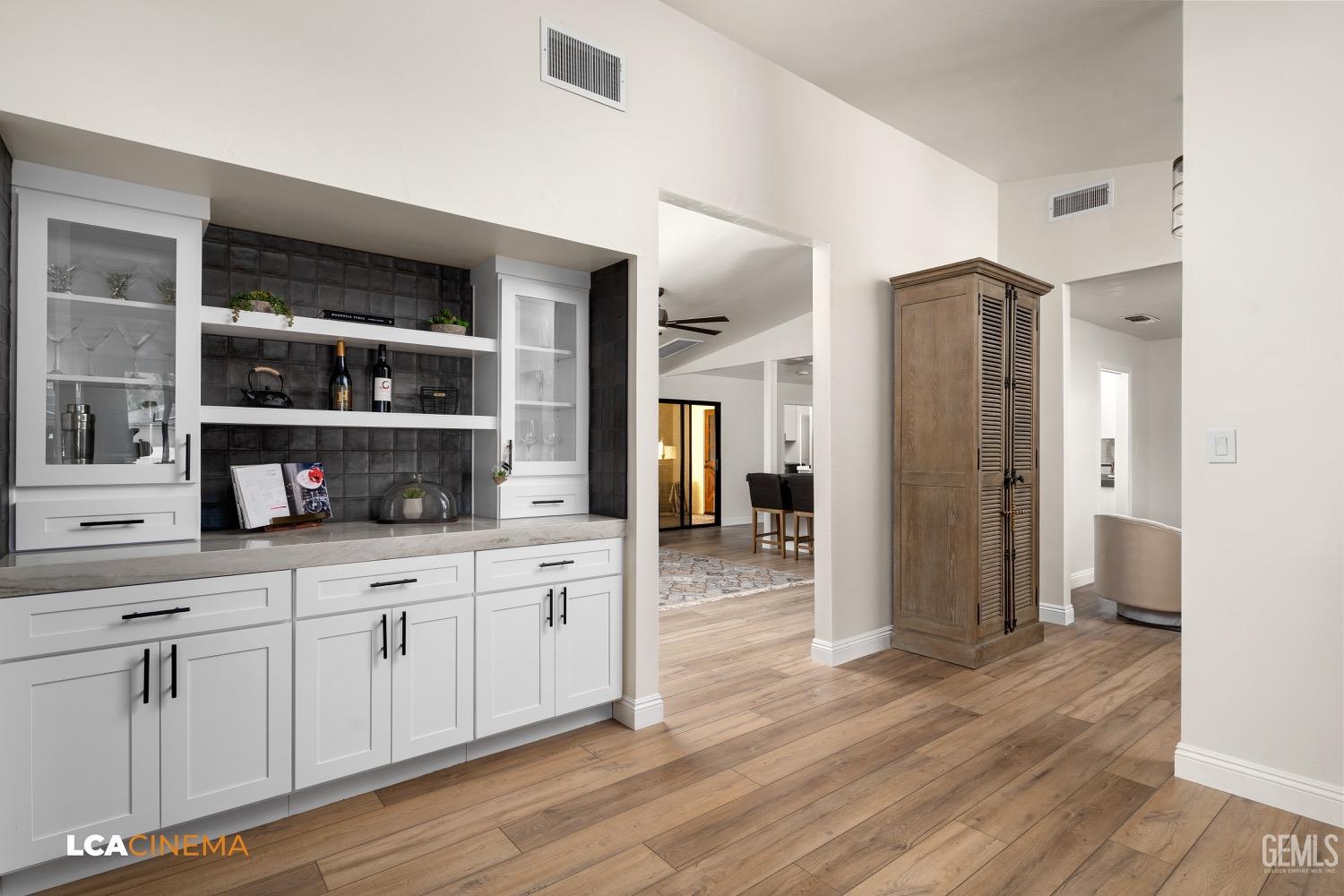 Undisclosed Address Bakersfield, CA 93312 - Photo 10 of 28 a kitchen with stainless steel appliances granite countertop a refrigerator and a sink