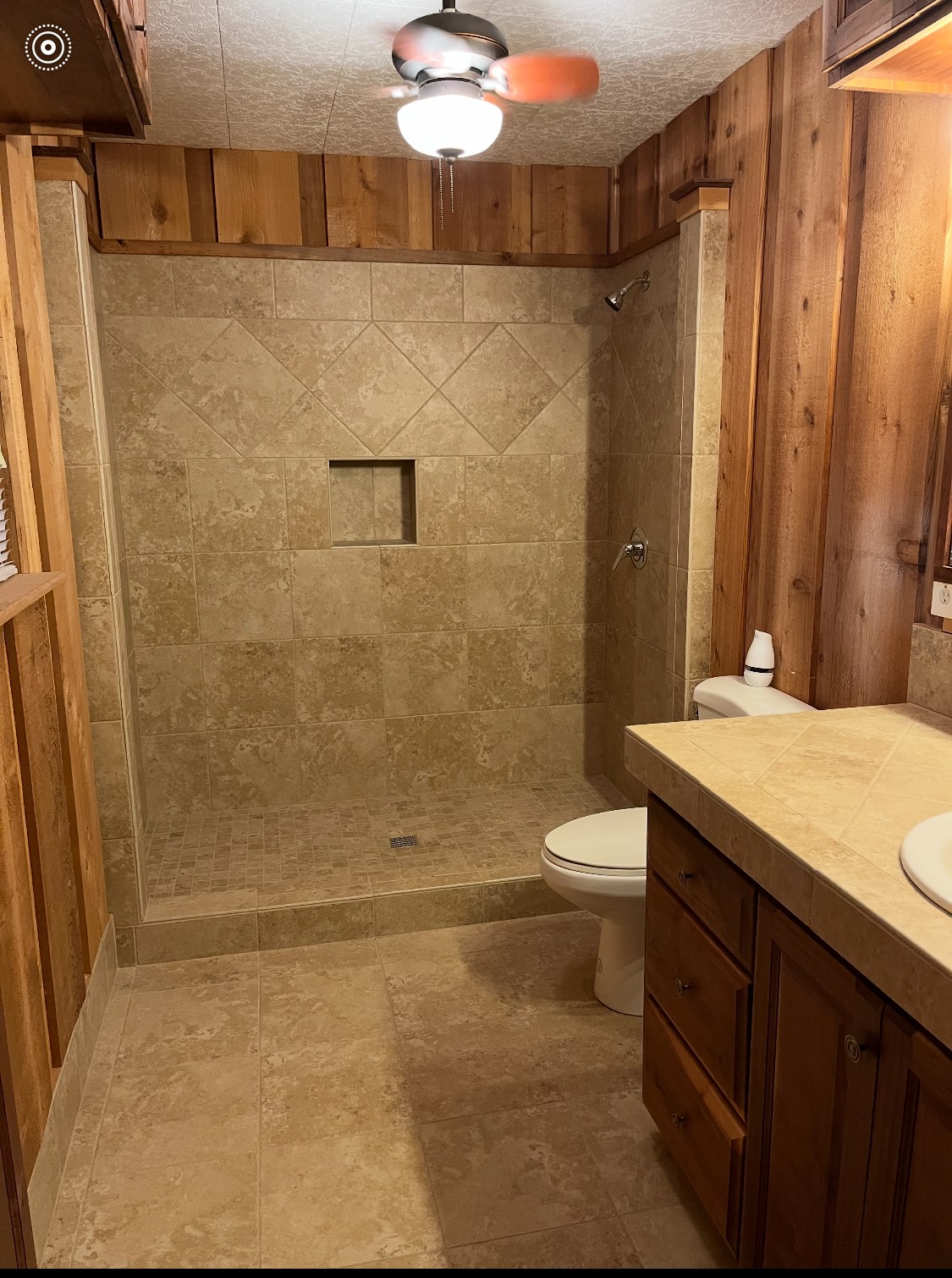 65 Farm To Market Road 3454 Huntsville, TX 77320 - Photo 20 of 37 a bathroom with a granite countertop shower toilet and sink
