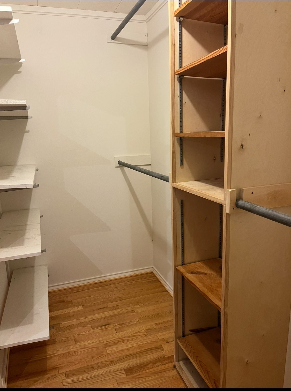 65 Farm To Market Road 3454 Huntsville, TX 77320 - Photo 22 of 37 a view of an empty room with wooden floor