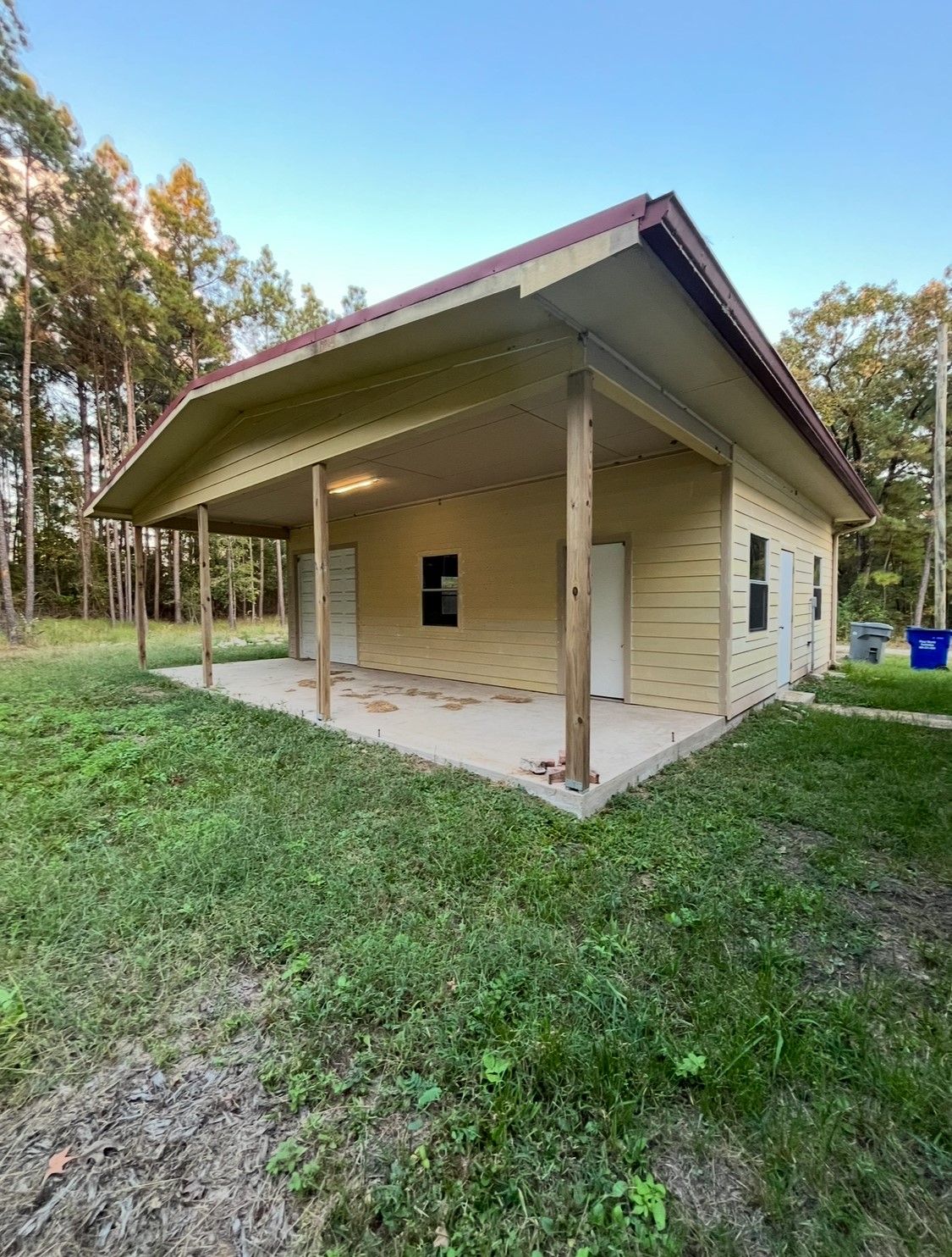 65 Farm To Market Road 3454 Huntsville, TX 77320 - Photo 32 of 37 a view of a house with a yard