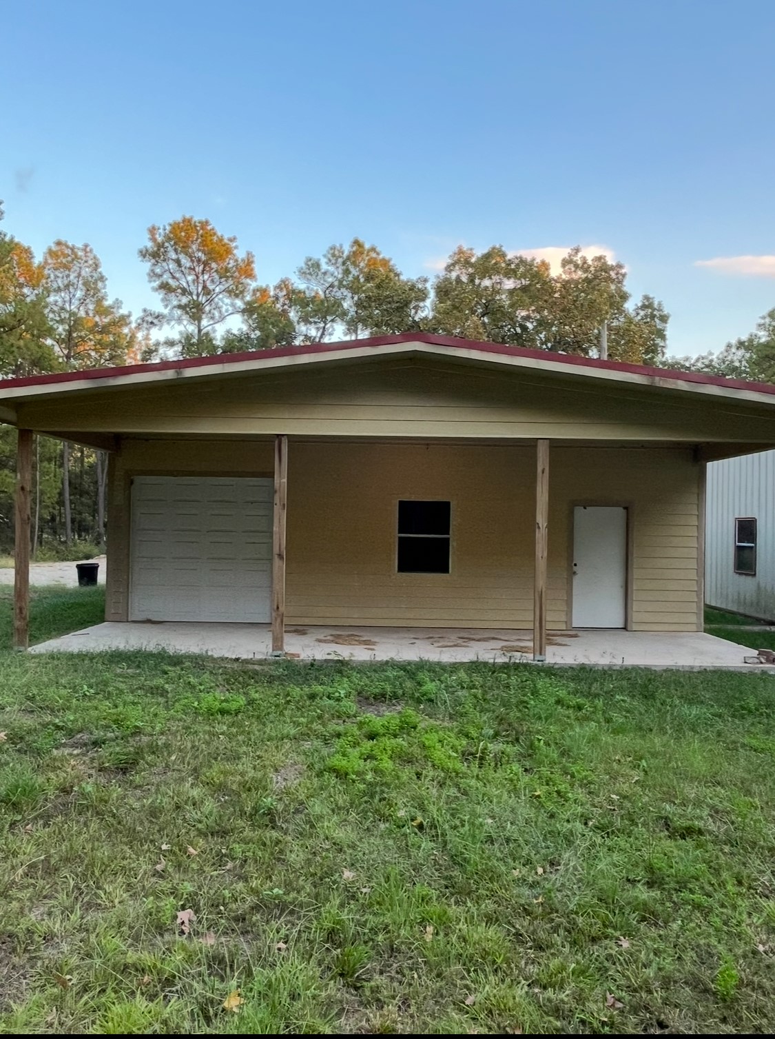 65 Farm To Market Road 3454 Huntsville, TX 77320 - Photo 33 of 37 a front view of a house with a yard