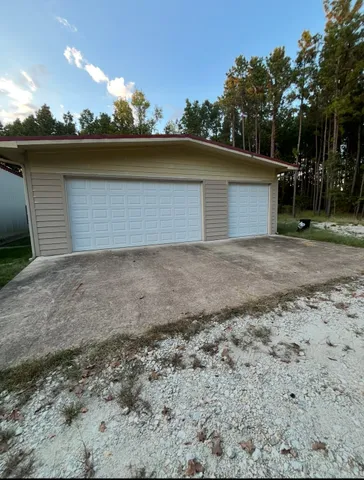 a view of back yard of the house