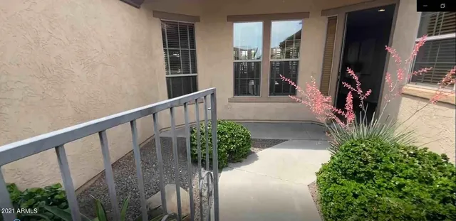 a view of balcony with wooden floor