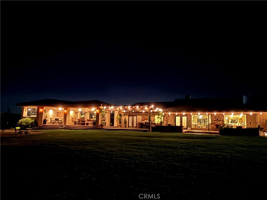 8686 Capelin Road Phelan, CA 92371 - Photo 1 of 1 a view of outdoor space with a flat screen tv