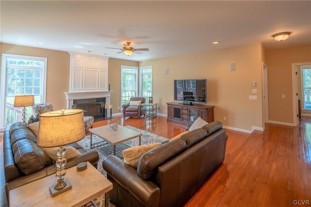 2296 Eldemere Circle Lower Macungie Township, PA 18062 - Photo 16 of 50 a living room with furniture and a flat screen tv