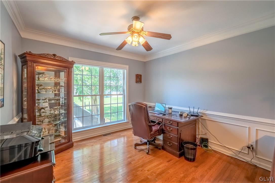 2296 Eldemere Circle Lower Macungie Township, PA 18062 - Photo 18 of 50 a view of a workspace with furniture and a window