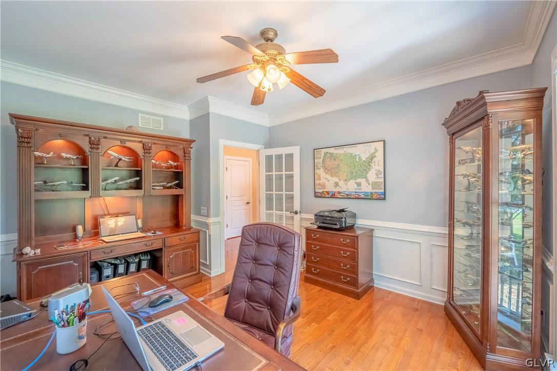 2296 Eldemere Circle Lower Macungie Township, PA 18062 - Photo 19 of 50 a living room with furniture and large windows