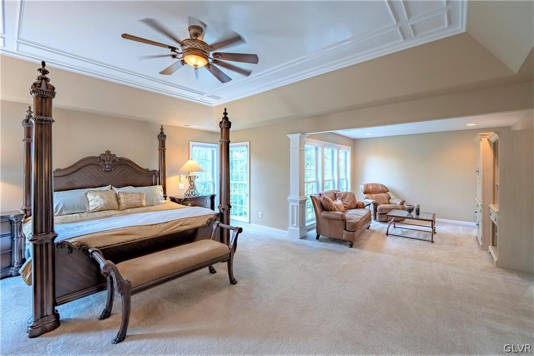 2296 Eldemere Circle Lower Macungie Township, PA 18062 - Photo 24 of 50 a living room with furniture and a chandelier