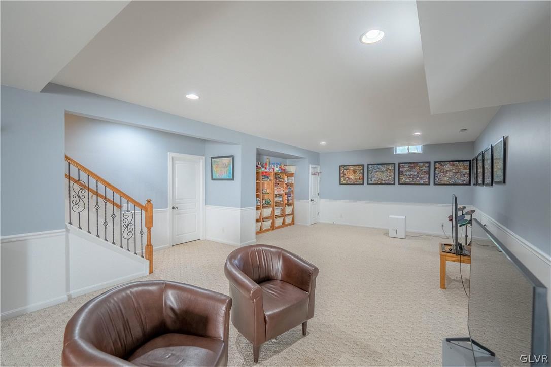 2296 Eldemere Circle Lower Macungie Township, PA 18062 - Photo 35 of 50 a living room with furniture and a wooden floor