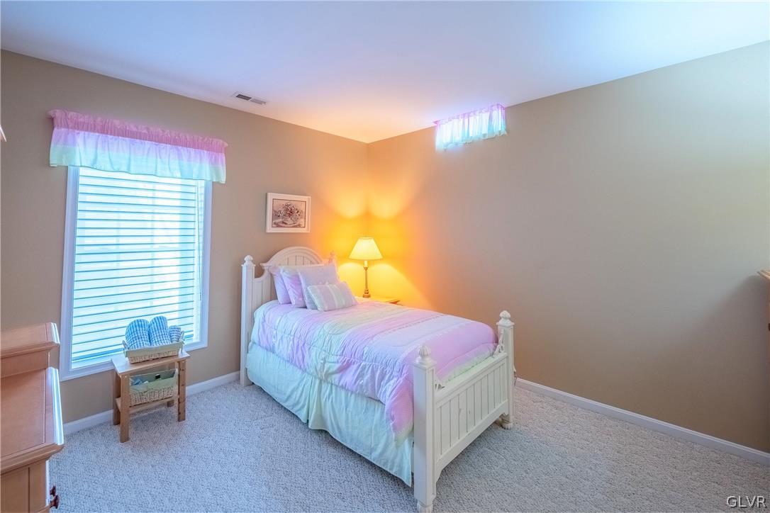 2296 Eldemere Circle Lower Macungie Township, PA 18062 - Photo 38 of 50 a bedroom with a bed and a window