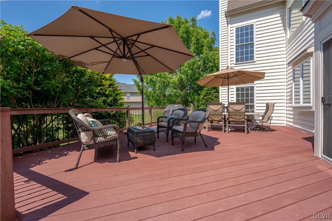 2296 Eldemere Circle Lower Macungie Township, PA 18062 - Photo 41 of 50 an outdoor space with furniture and umbrella