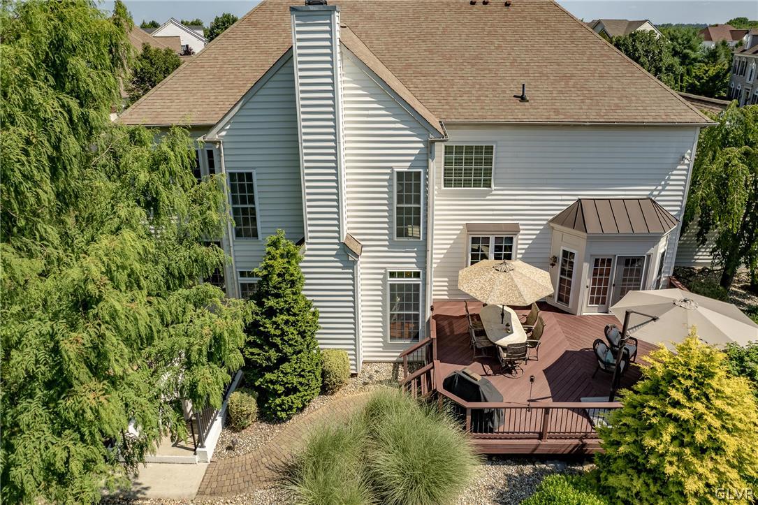 2296 Eldemere Circle Lower Macungie Township, PA 18062 - Photo 43 of 50 a view of a house with backyard and sitting area