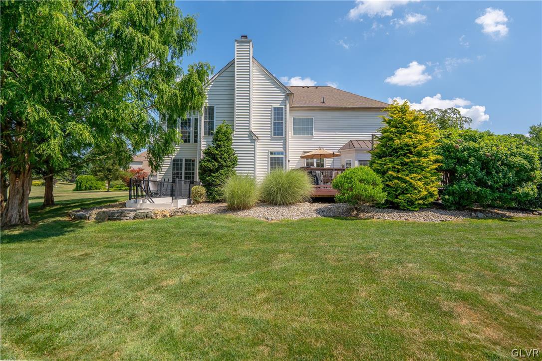 2296 Eldemere Circle Lower Macungie Township, PA 18062 - Photo 44 of 50 a front view of a house with garden