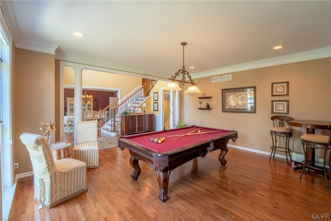 2296 Eldemere Circle Lower Macungie Township, PA 18062 - Photo 6 of 50 a room with furniture and wooden floor