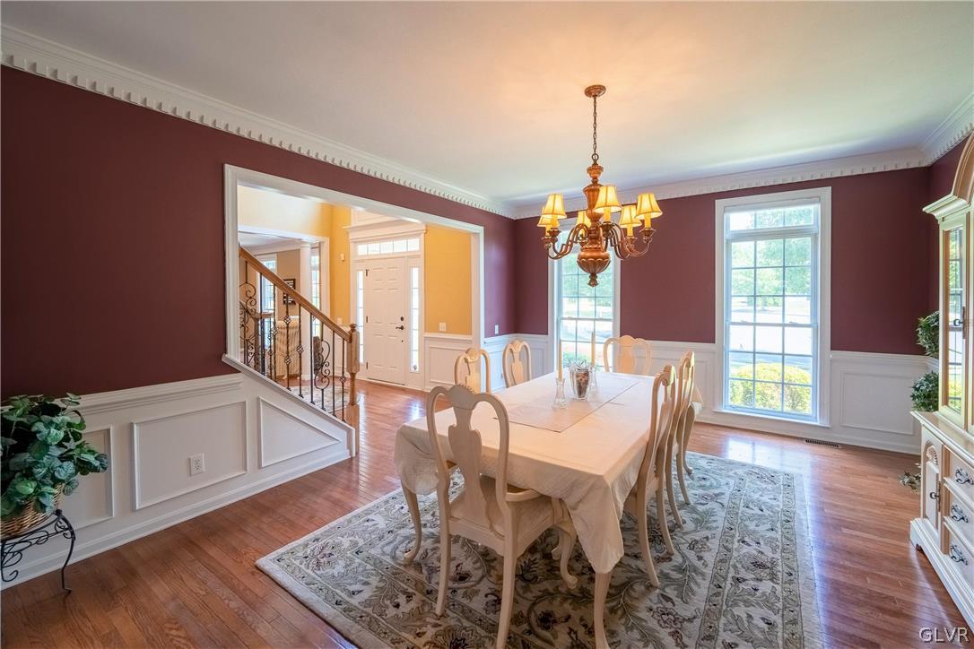 2296 Eldemere Circle Lower Macungie Township, PA 18062 - Photo 8 of 50 a view of a dining room with furniture window and wooden floor