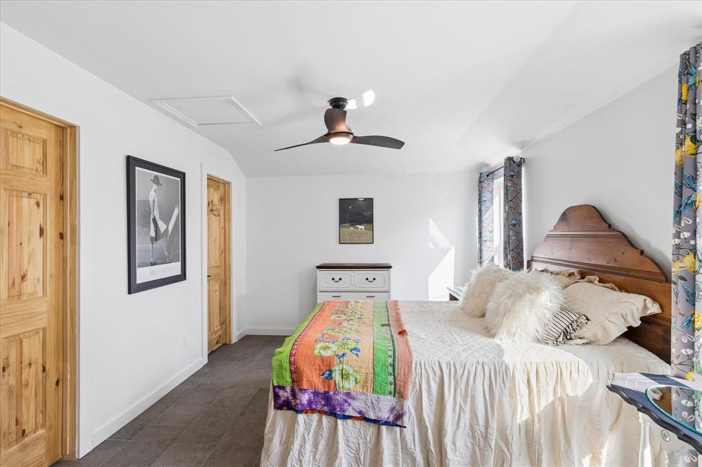 3600 Westcliff Road South Fort Worth, TX 76109 - Photo 31 of 38 a bedroom with a bed and wooden floor