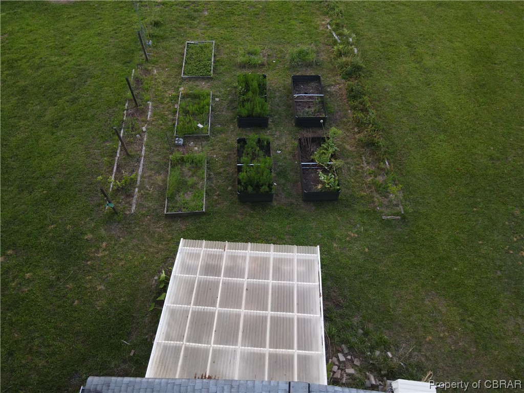 9223 Guinea Road Hayes, VA 23072 - Photo 15 of 50 Greenhouse & raised beds