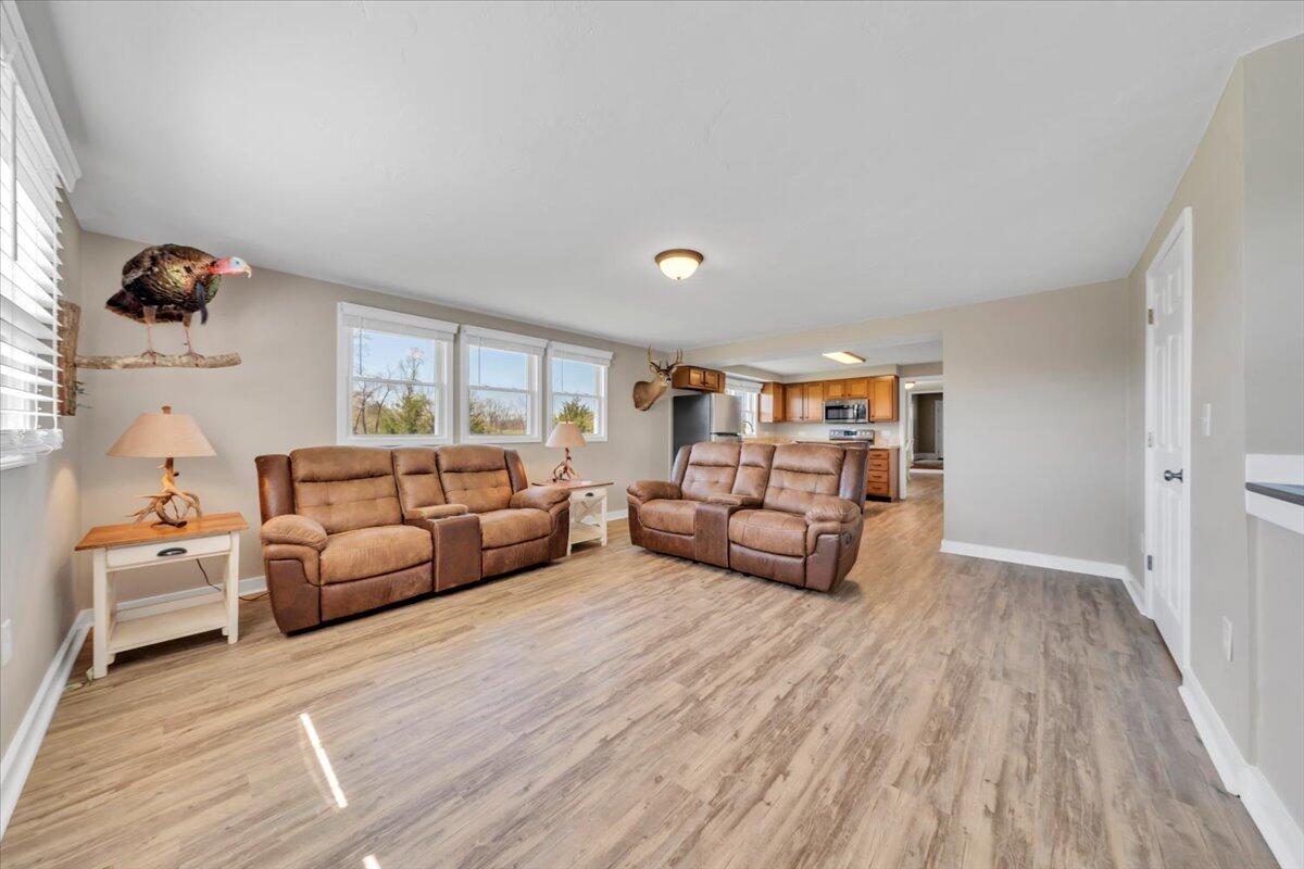 3861 Wheatland Road Bedford, VA 24523 - Photo 32 of 99 a living room with furniture and wooden floor