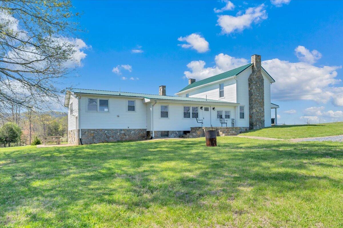 3861 Wheatland Road Bedford, VA 24523 - Photo 51 of 99 a view of a house with a yard