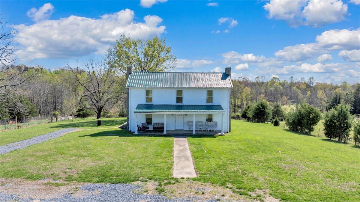 3861 Wheatland Road Bedford, VA 24523 - Photo 56 of 99 a front view of a house with garden