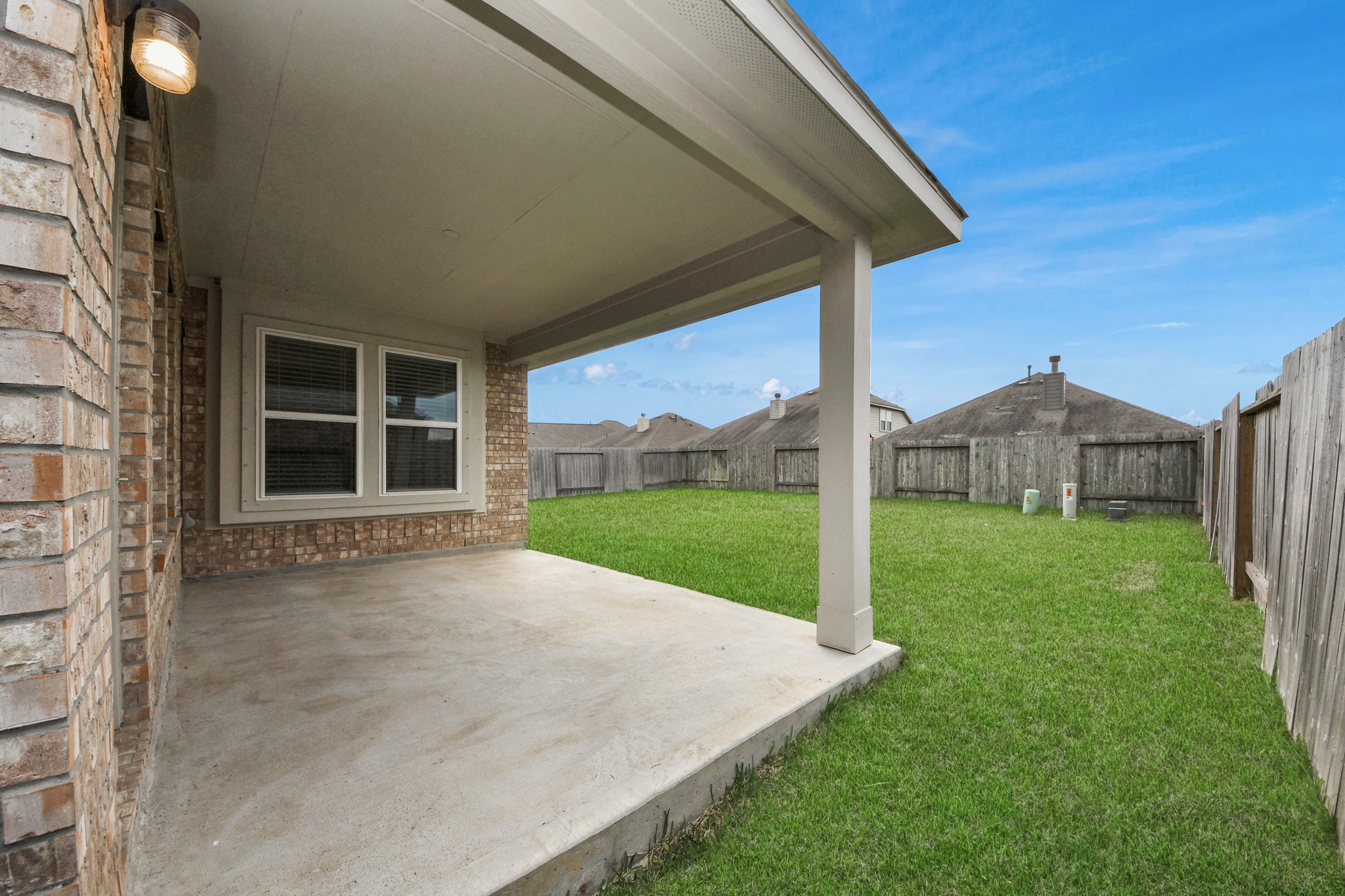 1614 Diamond Mountain Drive Rosharon, TX 77583 - Photo 33 of 40 a view of a house with backyard and porch