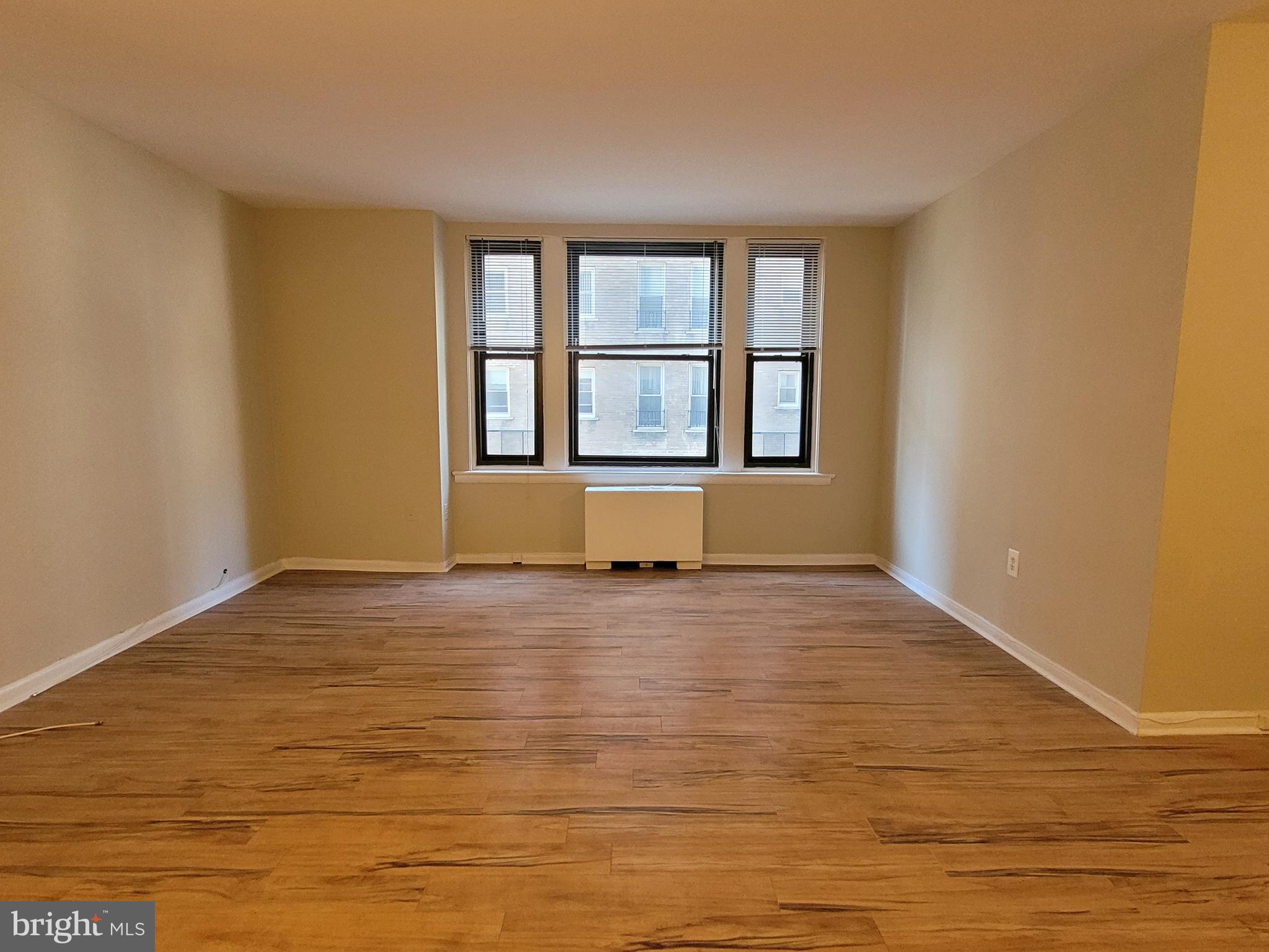 135 South 19th Street, Unit 908 Philadelphia, PA 19103 - Photo 2 of 20 a view of an empty room with window