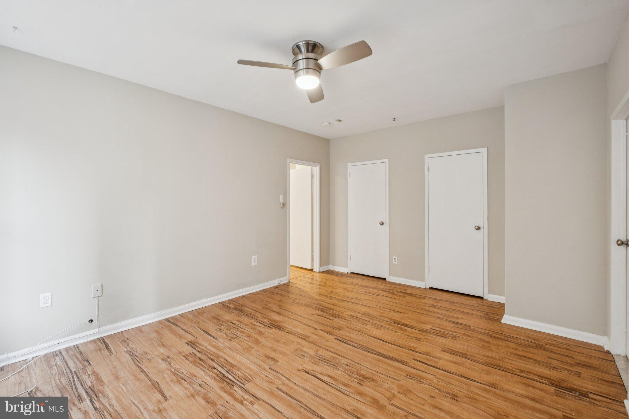 135 South 19th Street, Unit 908 Philadelphia, PA 19103 - Photo 9 of 18 wooden floor in an empty room