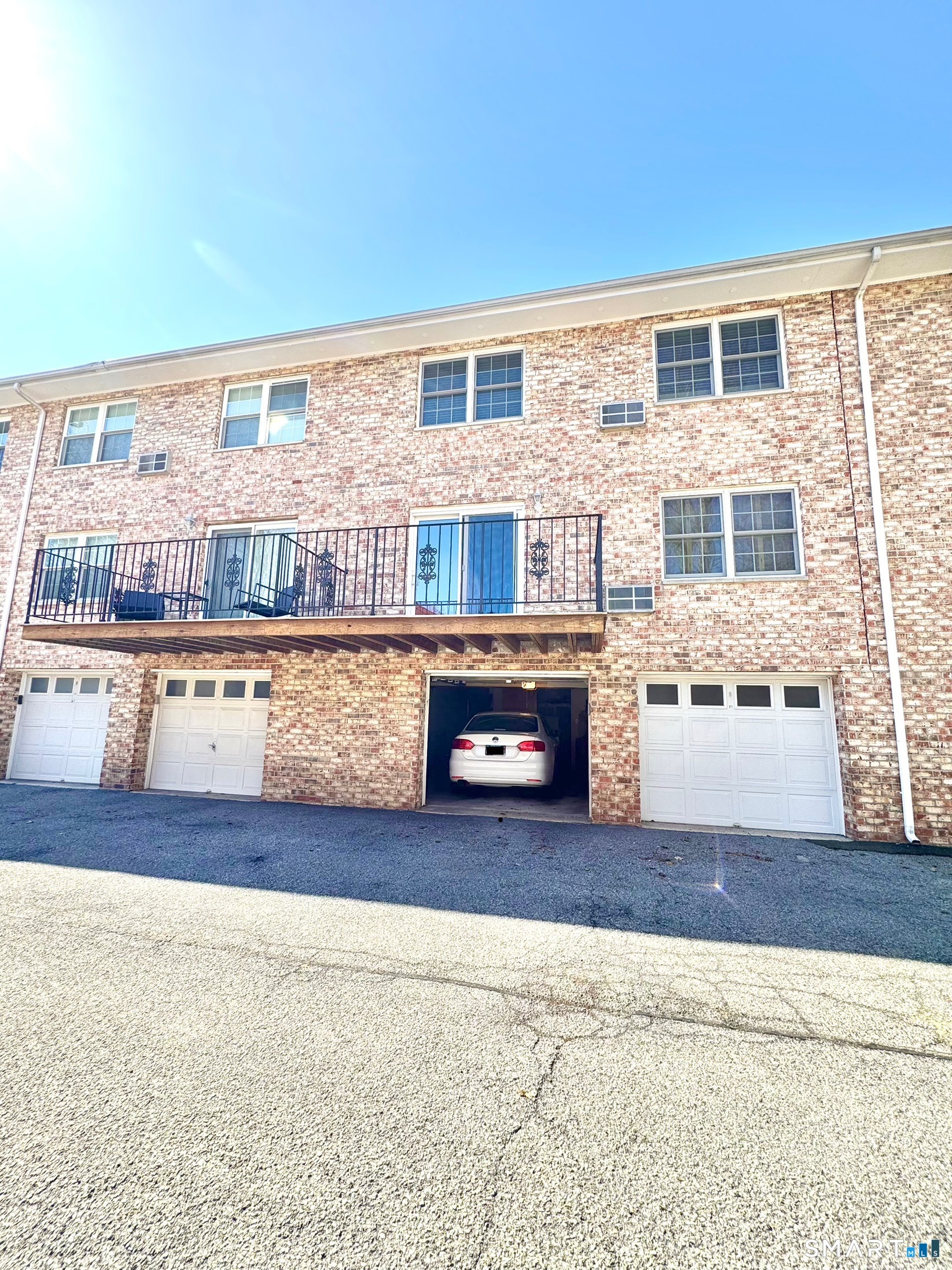 39 Woodway Road, Unit C5 Stamford, CT 06907 - Photo 50 of 55 Back of Unit, balcony, 1 car garage